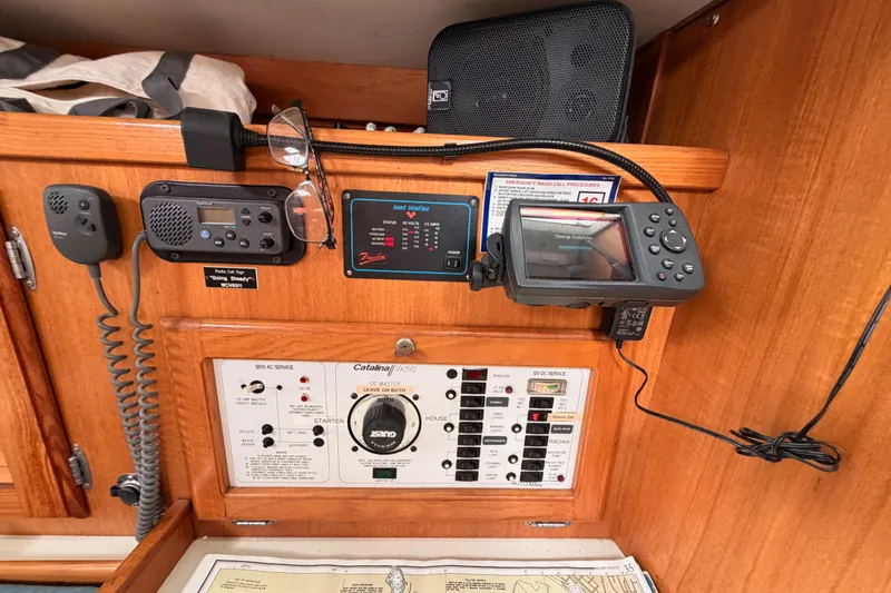 Slide: The Image of Control panel of a 1996 Catalina 36 MkII sailboat with navigation equipment. - 48