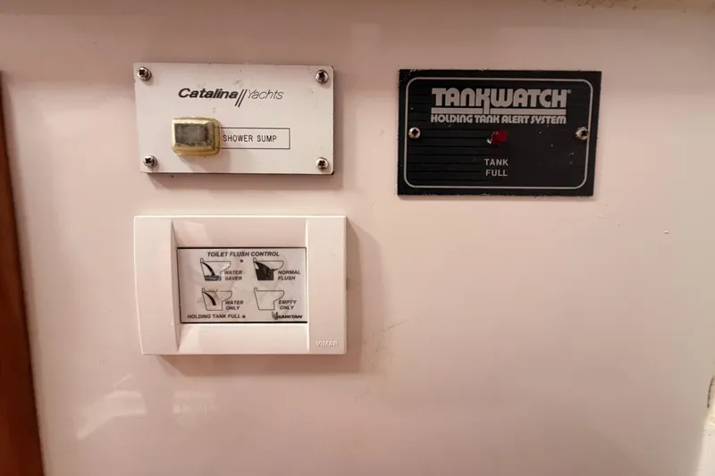 Slide: The Image of Control panel of a 1996 Catalina 36 MkII yacht with shower sump and tank alert system. - 57