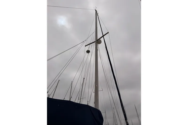 Slide: The Image of Mast of a 1996 Catalina 36 MkII sailboat against a cloudy sky. - 6