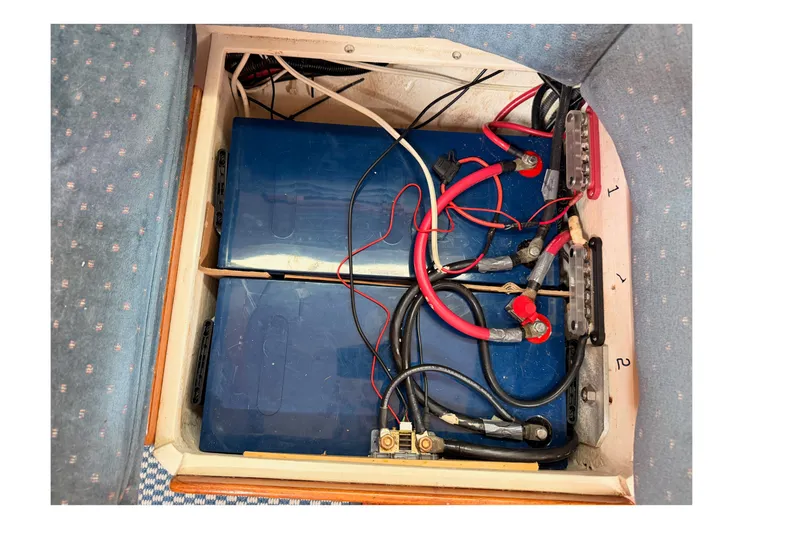 Slide: The Image of Battery compartment of a 1996 Catalina 36 MkII sailboat with wiring connections. - 68
