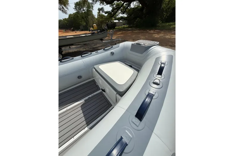 Slide: The Image of 2026 Highfield Classic 360 FCT inflatable boat interior with seating and storage. - 3