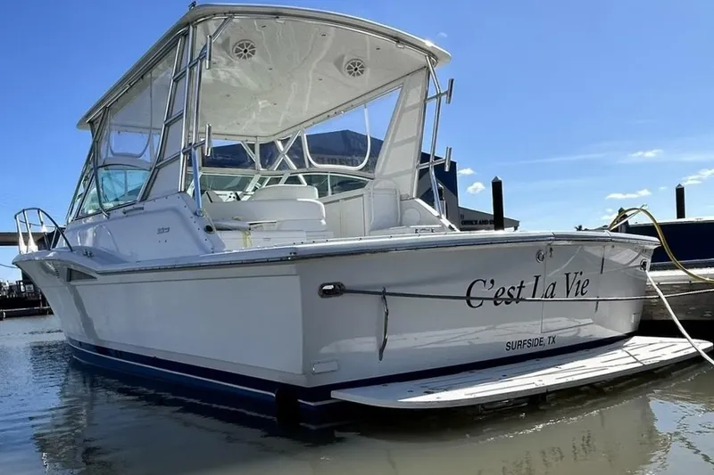 The Image of 1996 Hatteras 39 Sport Express boat named "C'est La Vie" docked in Surfside, TX. - 0