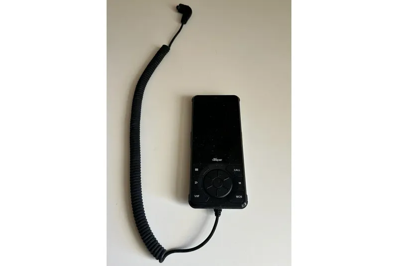 Slide: The Image of Handheld marine radio with coiled cord, suitable for 1996 Hatteras 39 Sport Express. - 35