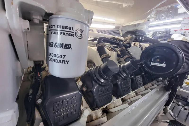 Slide: The Image of Engine room of 2002 Viking 65 Enclosed Bridge with Detroit Diesel fuel filter. - 86