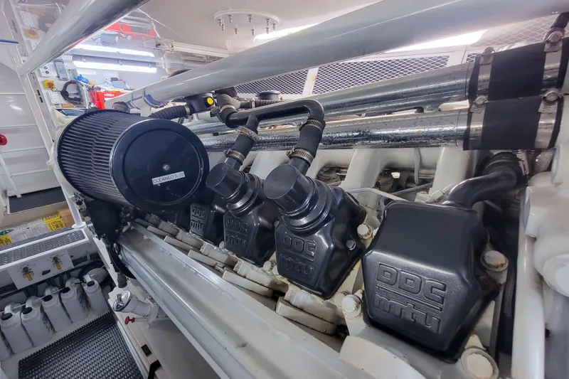 Slide: The Image of Engine room of 2002 Viking 65 Enclosed Bridge yacht, showcasing DDC components. - 87