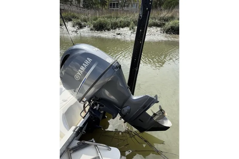 Slide: The Image of 2016 Boston Whaler 170 Montauk with Yamaha outboard motor in shallow water. - 23