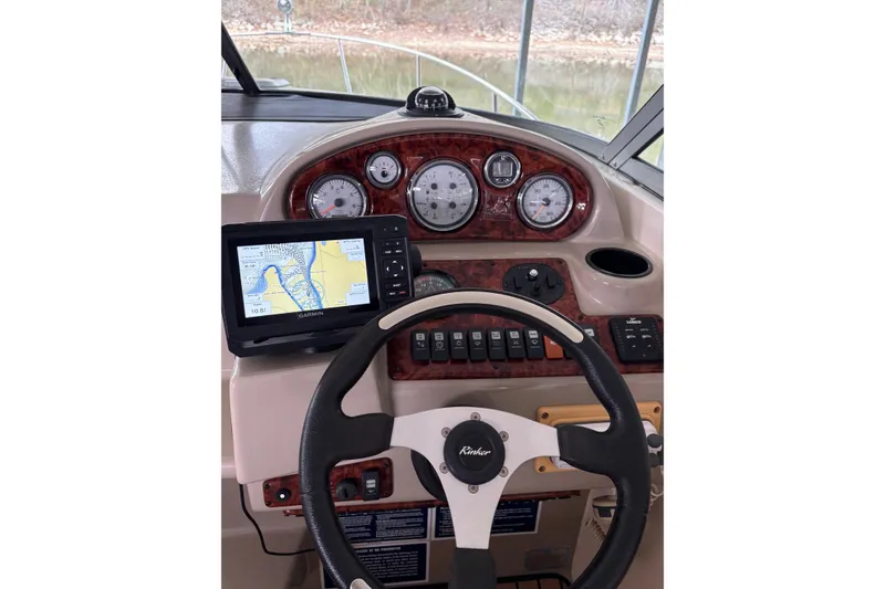 Slide: The Image of 2003 Rinker Fiesta Vee 270 helm with Garmin GPS and classic gauges. - 16