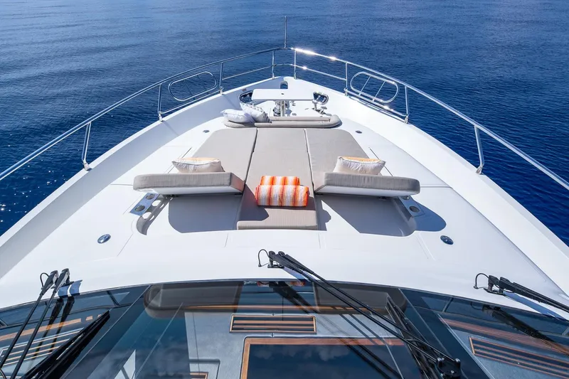 Slide: The Image of Luxurious 2019 Regency P65 yacht deck with sun loungers and ocean view. - 10