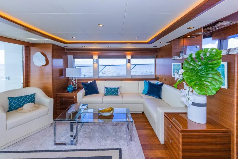 Slide: The Image of Luxurious Regency P65 yacht interior, 2019 model, featuring elegant seating and modern decor. - 30