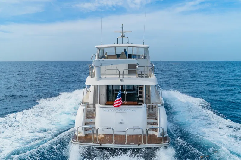 Slide: The Image of Luxury yacht Regency P65 cruising on open sea, 2019 model. - 4