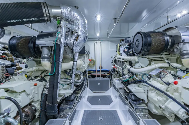 Slide: The Image of Engine room of 2019 Regency P65 yacht with Volvo Penta marine engines. - 54