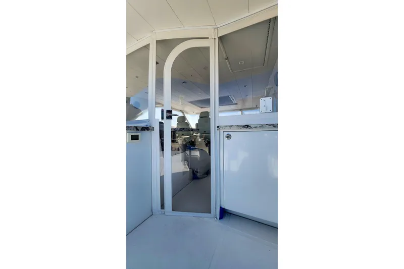 Slide: The Image of Interior view of 2019 Regency P65 yacht, featuring sleek design and modern amenities. - 59