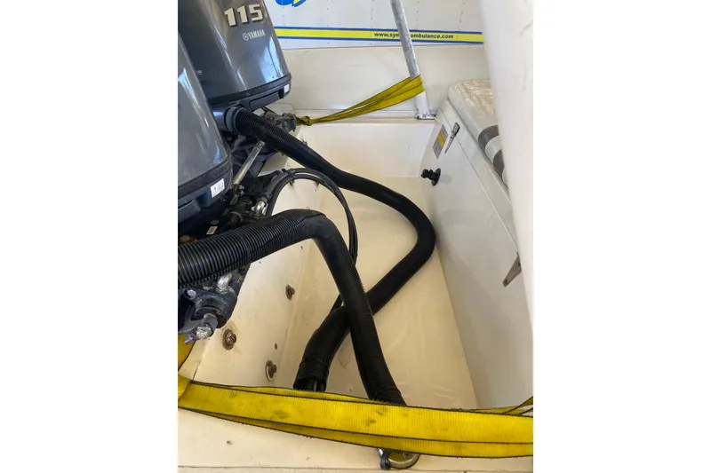 Slide: The Image of Engine compartment of a 2000 Novurania 21 boat with Yamaha 115 motor. - 10