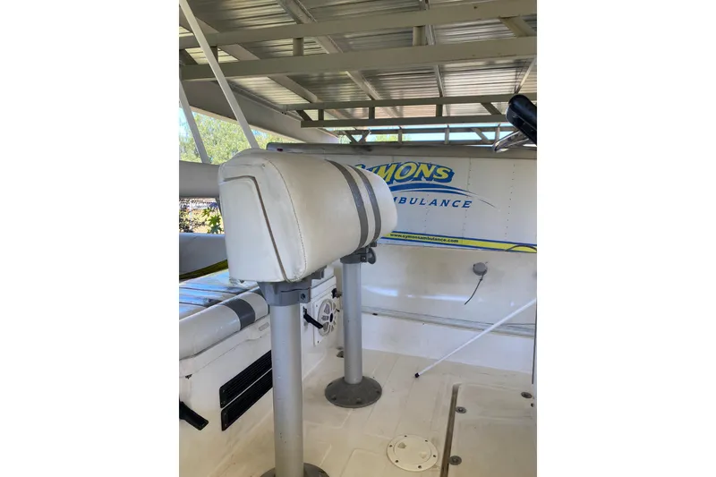 Slide: The Image of Interior of a 2000 Novurania 21 boat with seating and equipment. - 11