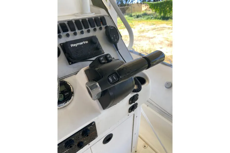 Slide: The Image of Control panel of a 2000 Novurania 21 boat with Raymarine equipment. - 6