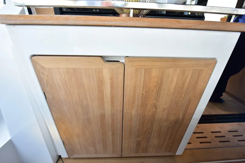 Slide: The Image of 2022 Sealine C430 yacht interior with wooden cabinetry and modern design. - 33