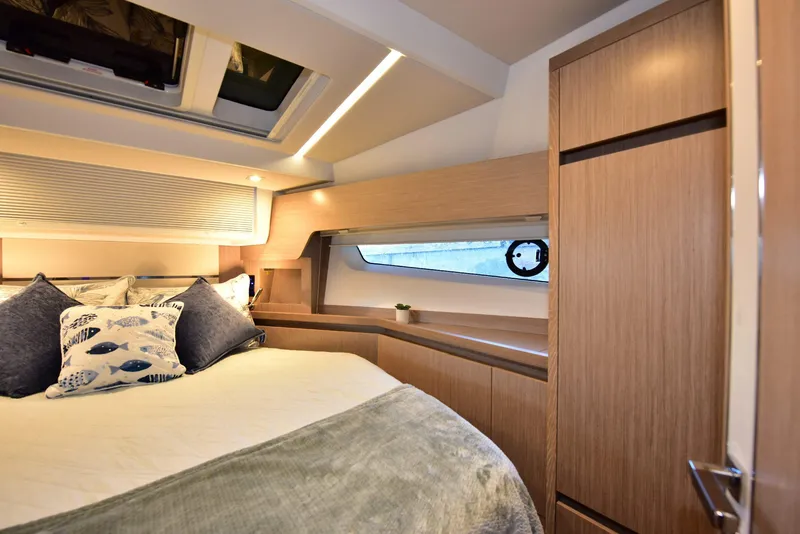 Slide: The Image of Luxurious cabin interior of 2022 Sealine C430 yacht with modern design and cozy bedding. - 45