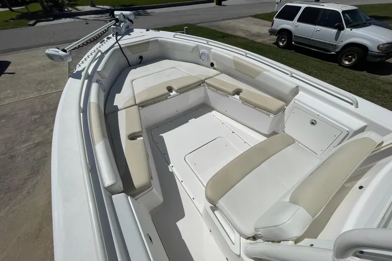 Slide: The Image of 2017 Everglades 243 Center Console boat with spacious seating and modern design. - 7