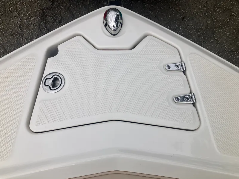 Slide: The Image of Chaparral 216 SSi 2011 boat hatch with latch and hinges. - 18