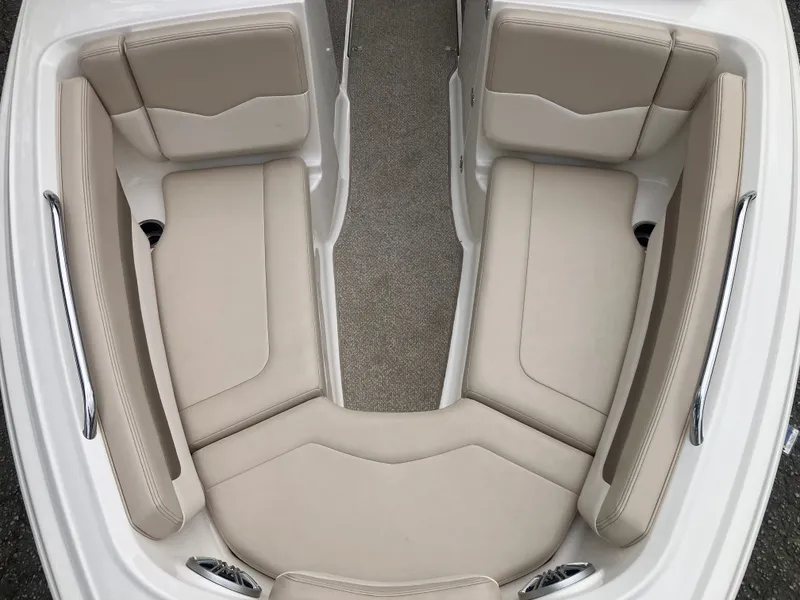 Slide: The Image of Interior of 2011 Chaparral 216 SSi with beige seating. - 19