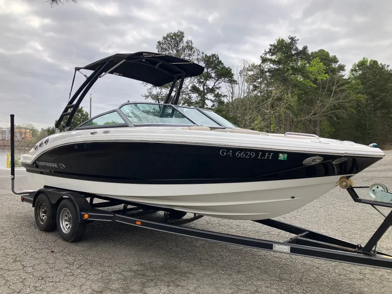 Slide: The Image of 2011 Chaparral 216 SSi boat on trailer, side view. - 3