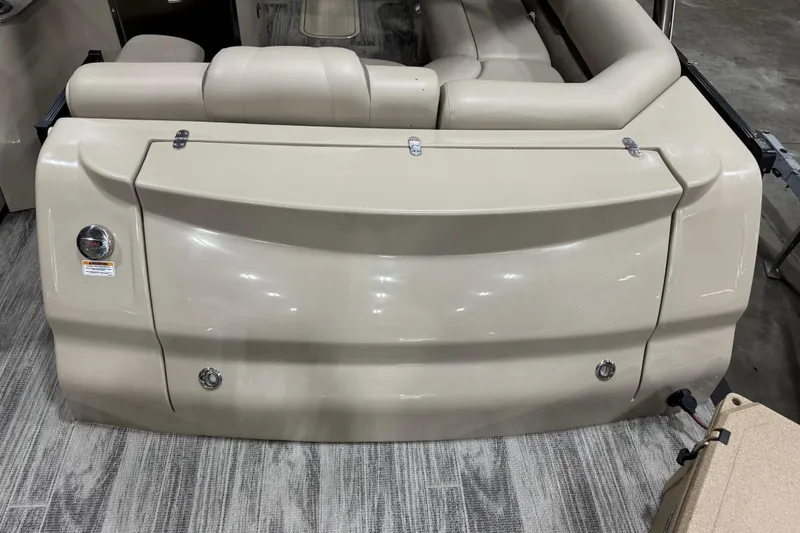 Slide: The Image of 2022 Avalon Catalina Platinum Cruise boat interior with beige seating and sleek design. - 19