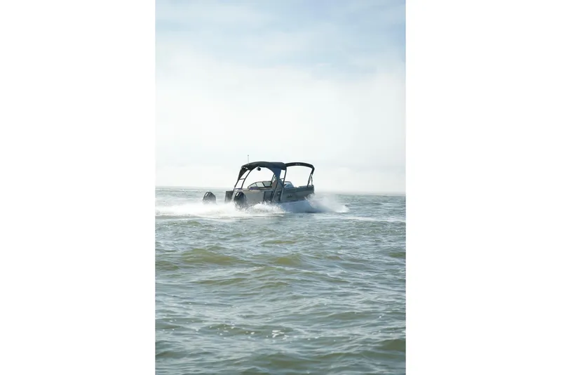Slide: The Image of 2022 Avalon Catalina Platinum Cruise boat speeding on open water. - 35