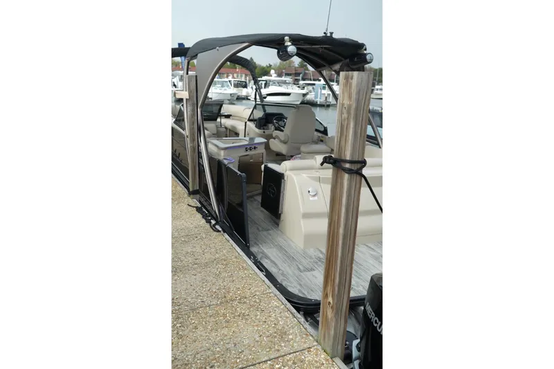 Slide: The Image of 2022 Avalon Catalina Platinum Cruise boat docked, showcasing luxurious seating and sleek design. - 40