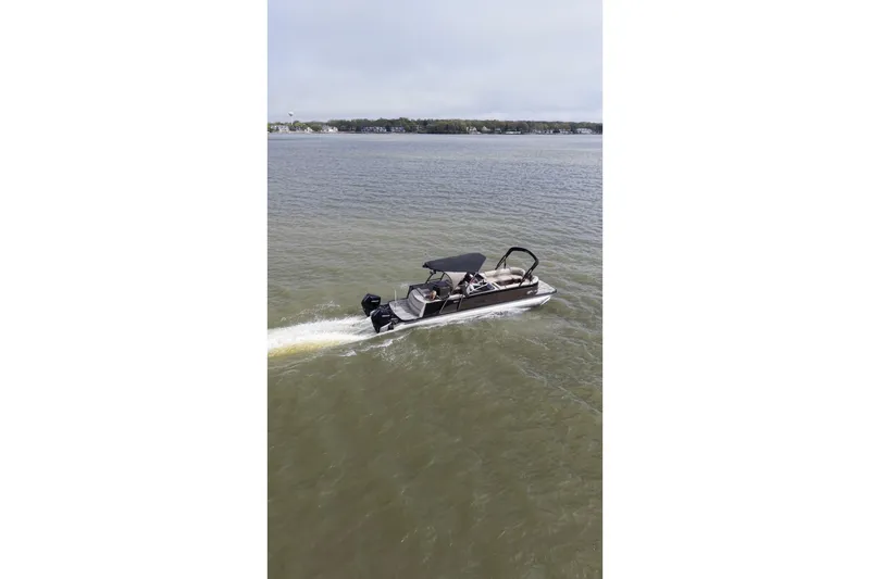Slide: The Image of 2022 Avalon Catalina Platinum Cruise boat cruising on a calm lake. - 55