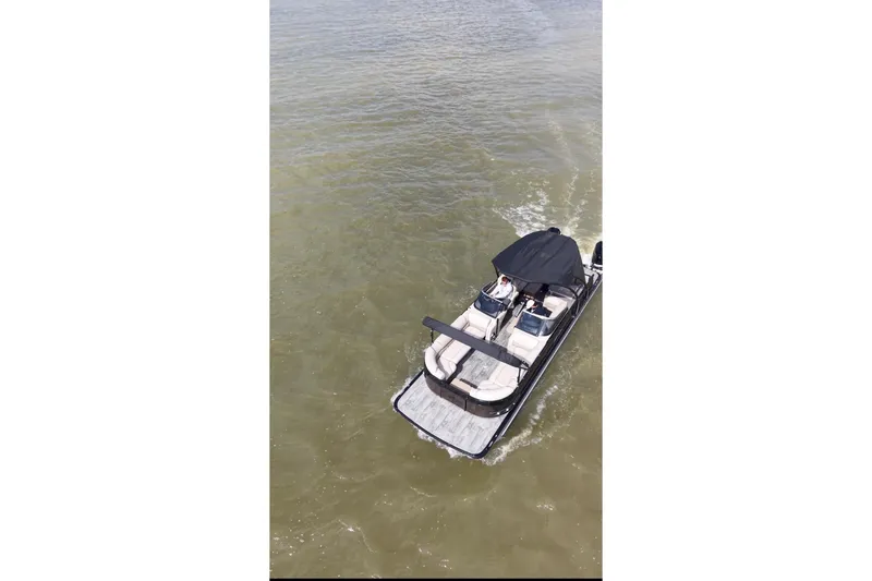 Slide: The Image of 2022 Avalon Catalina Platinum Cruise boat on open water, aerial view. - 57