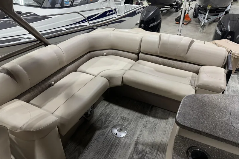 Slide: The Image of 2022 Avalon Catalina Platinum Cruise boat with luxurious beige seating. - 18