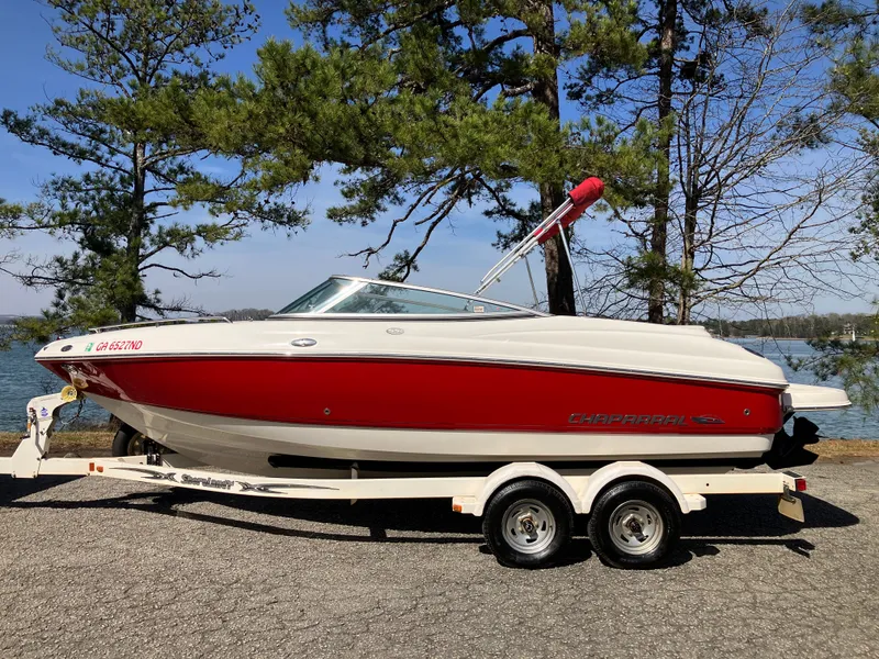 The Image of 2008 Chaparral 204 SSi boat on trailer by lakeside. - 0