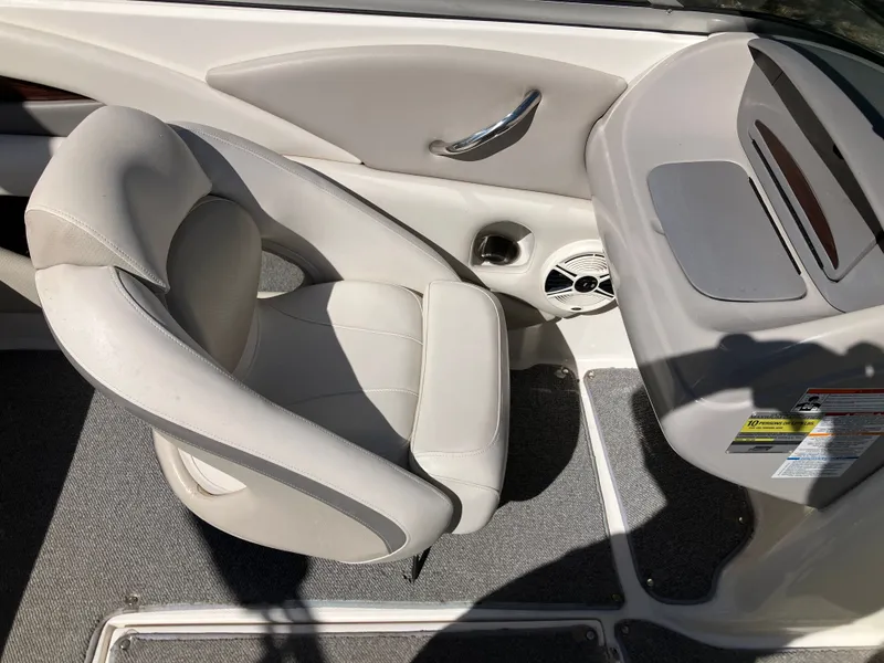 Slide: The Image of Interior of a 2008 Chaparral 204 SSi boat with seat and speaker. - 10