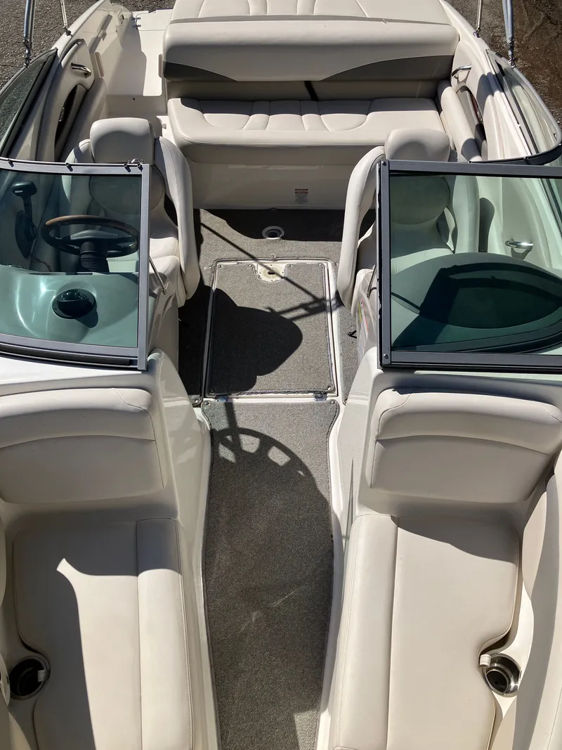 Slide: The Image of Interior of a 2008 Chaparral 204 SSi boat with beige seating. - 16
