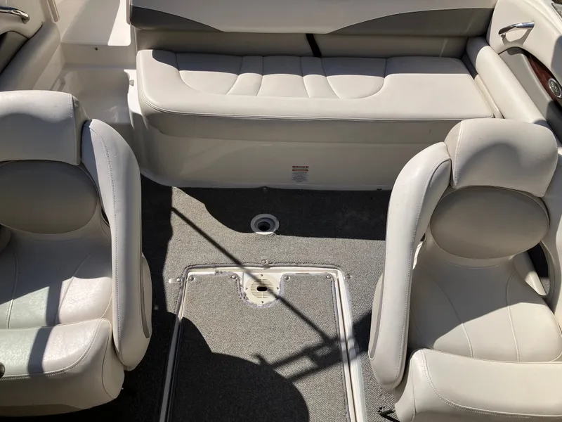 Slide: The Image of Interior of a 2008 Chaparral 204 SSi boat with beige seating. - 17