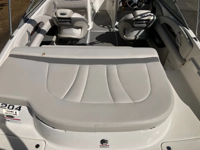 Slide: The Image of Interior of a 2008 Chaparral 204 SSi boat with white seating. - 7