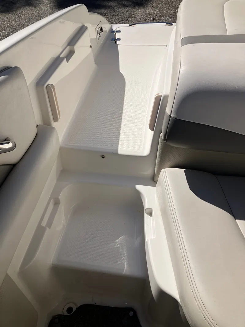 Slide: The Image of Interior of a 2008 Chaparral 204 SSi boat, white upholstery. - 8