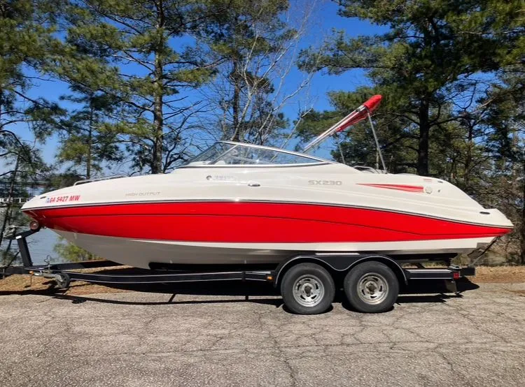 The Image of 2009 Yamaha SX230 boat on trailer outdoors. - 0