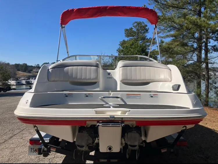 Slide: The Image of Rear view of a 2009 Yamaha SX230 boat with red sunshade. - 6