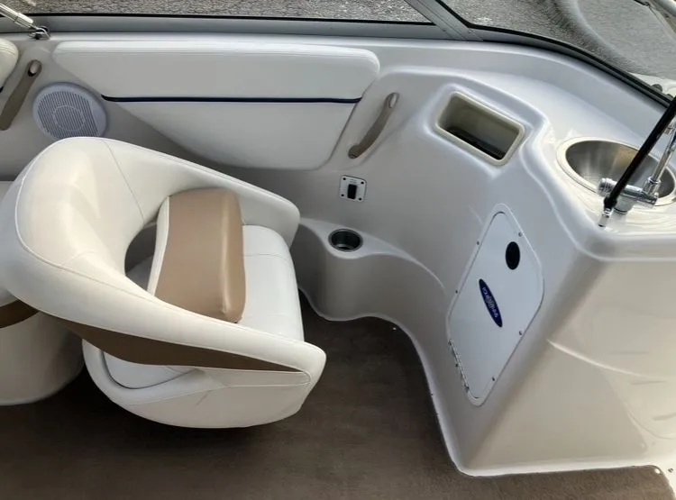 Slide: The Image of Interior of a 2007 Four Winns 204 Funship boat with seat and sink. - 13