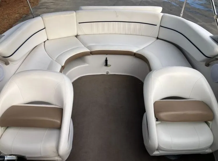Slide: The Image of Interior of a 2007 Four Winns 204 Funship boat with white seating. - 20