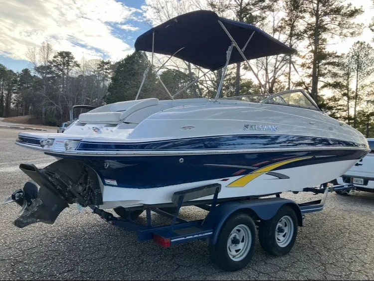 Slide: The Image of 2007 Four Winns 204 Funship boat on trailer outdoors. - 5