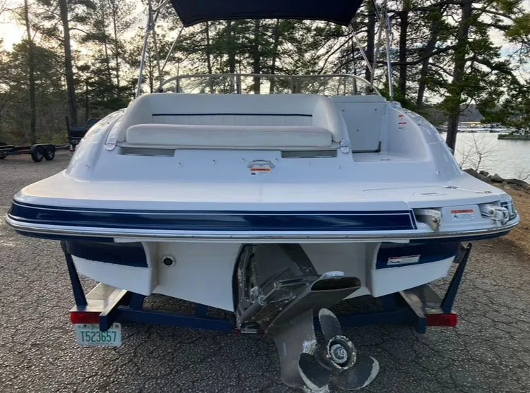 Slide: The Image of Rear view of a 2007 Four Winns 204 Funship boat by the shore. - 6