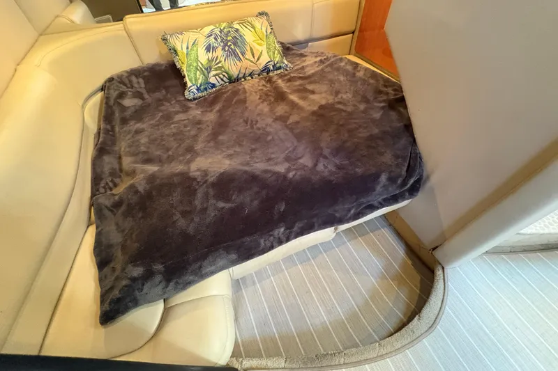 Slide: The Image of Interior of 2004 Formula 41 Performance Cruiser with cozy seating and decorative pillow. - 17