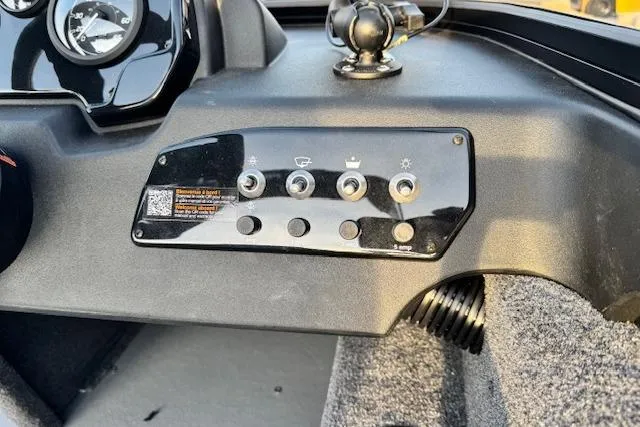 Slide: The Image of Control panel of 2026 Princecraft Holiday 162 WS MAX boat dashboard. - 10