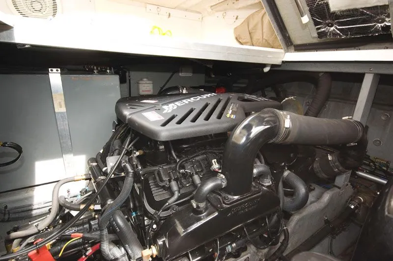 Slide: The Image of Engine room of a 2002 Sea Ray 380 Sundancer boat. - 11