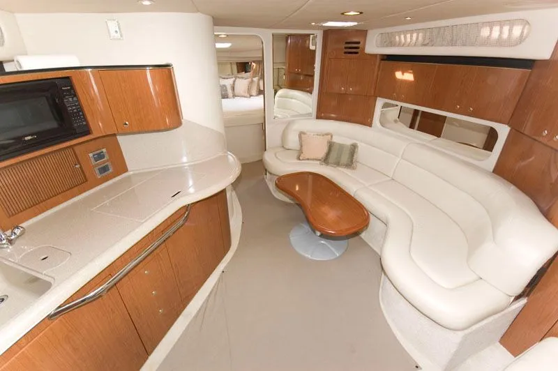 Slide: The Image of Interior of 2002 Sea Ray 380 Sundancer with elegant furnishings. - 3