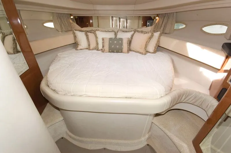 Slide: The Image of Luxurious cabin of 2002 Sea Ray 380 Sundancer with comfortable bed. - 6