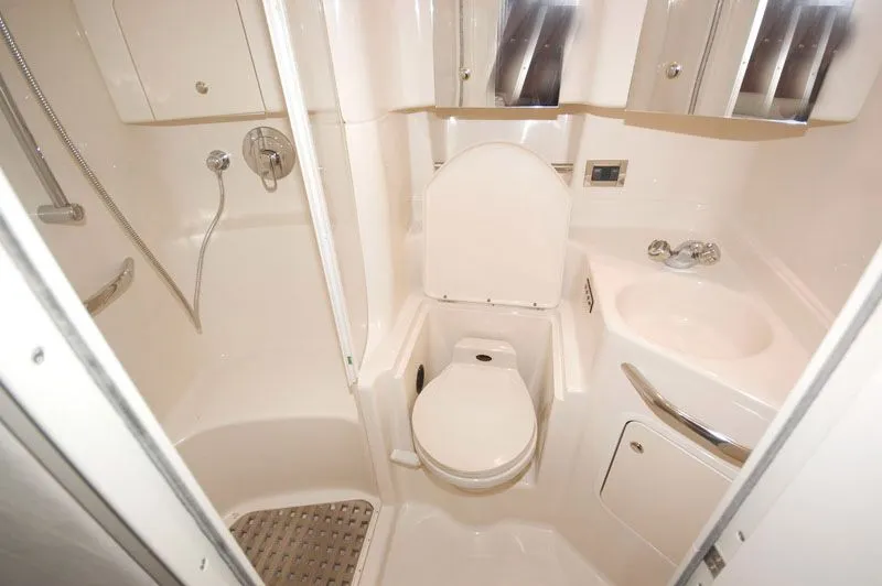 Slide: The Image of Sea Ray 380 Sundancer 2002 bathroom with shower and toilet. - 7