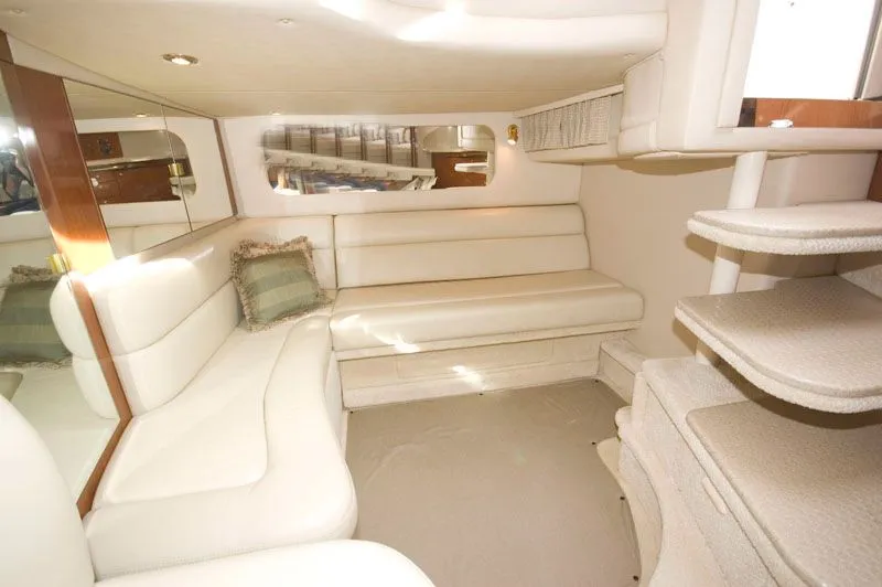 Slide: The Image of Interior of 2002 Sea Ray 380 Sundancer with beige upholstery. - 8